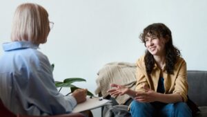 A woman attending individual therapy to support her post-treatment recovery.