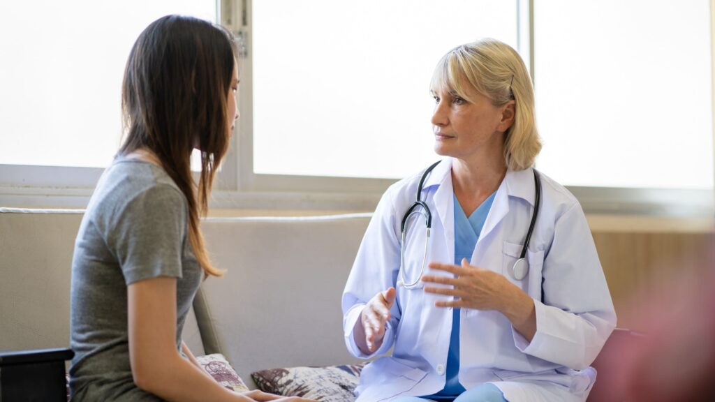 A professional offering guidance to a client on how to quit opiates.