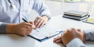 A specialist discussing ways to get Suboxone for free with a client.